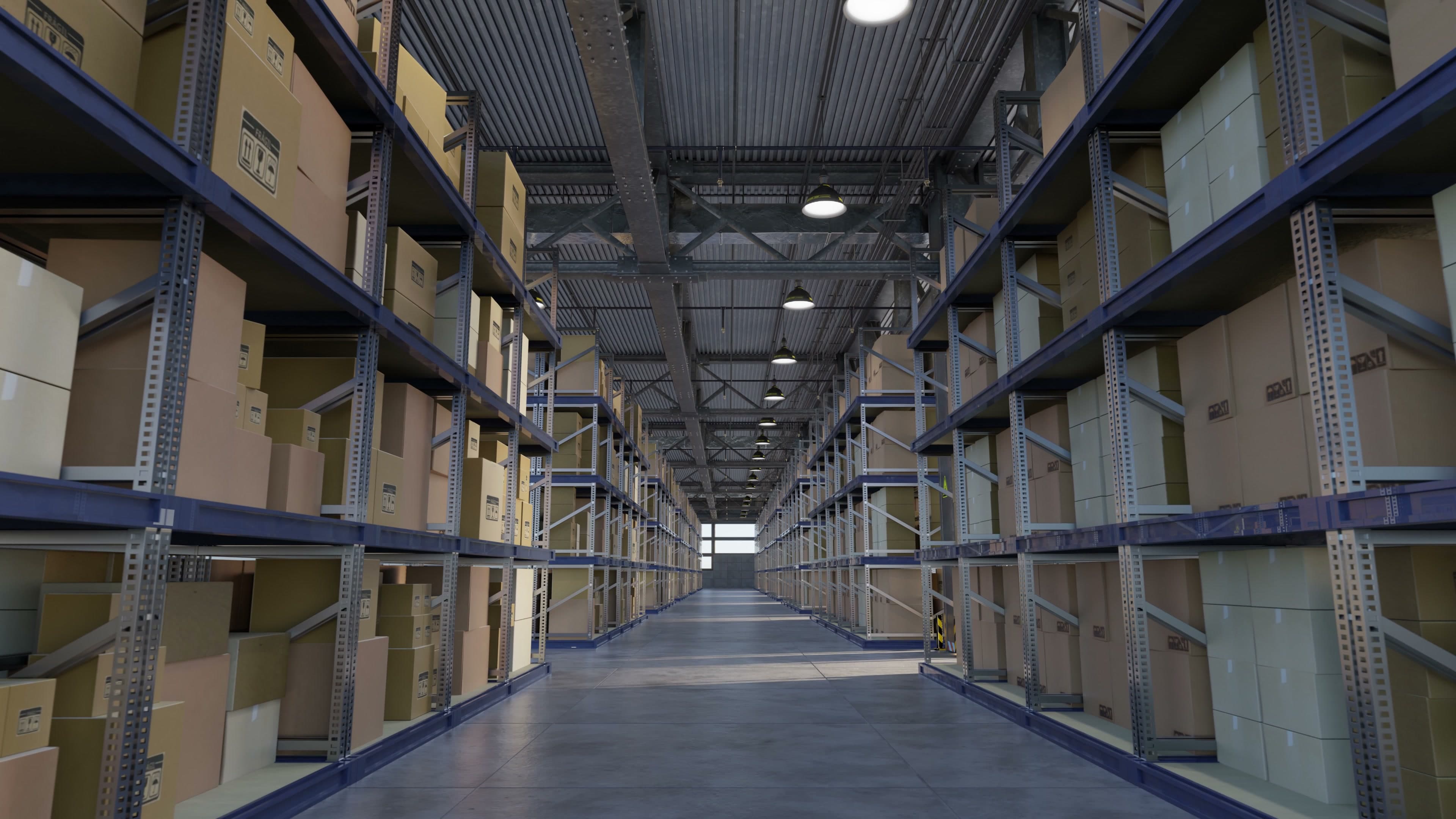 Warehouse interior with wide aisles, racking systems, and active floor operations